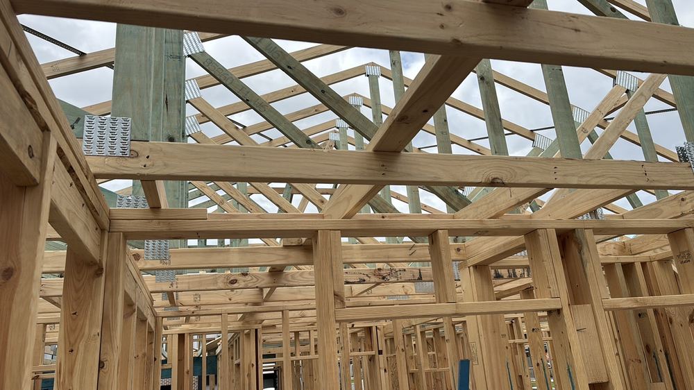 Trusses bearing on an internal wall that was never designed to carry them, found during a frame inspection in Beveridge