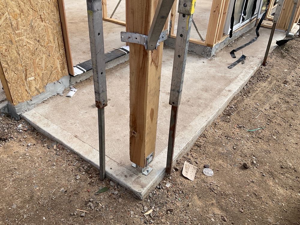 Vapour barrier not visible at ground level around the slab perimeter, found during a frame inspection in Beveridge