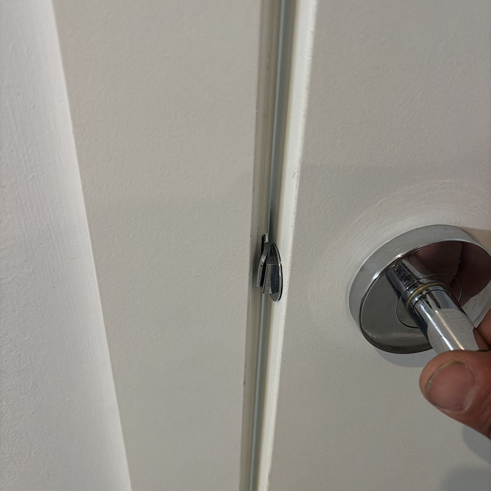 Door no longer latching in its frame when tried by hand, found during a defect investigation inspection in Pascoe Vale