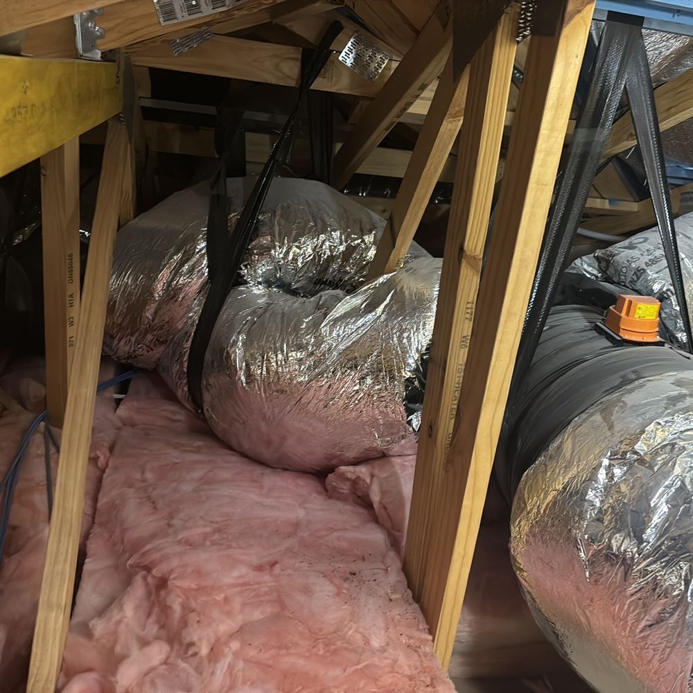 Heating and cooling ducts crimped in the roof, cutting airflow to rooms, found during a pre-handover (PCI) inspection in Beveridge
