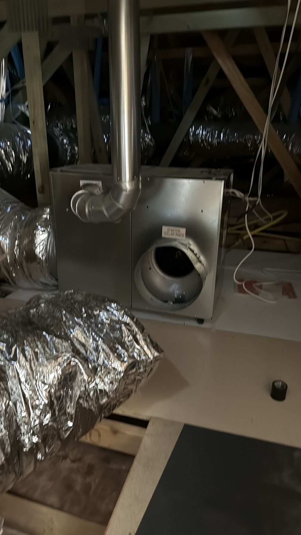 Heating ducts in the roof space loose or disconnected from their outlets, found during a pre-handover (PCI) inspection in Beveridge