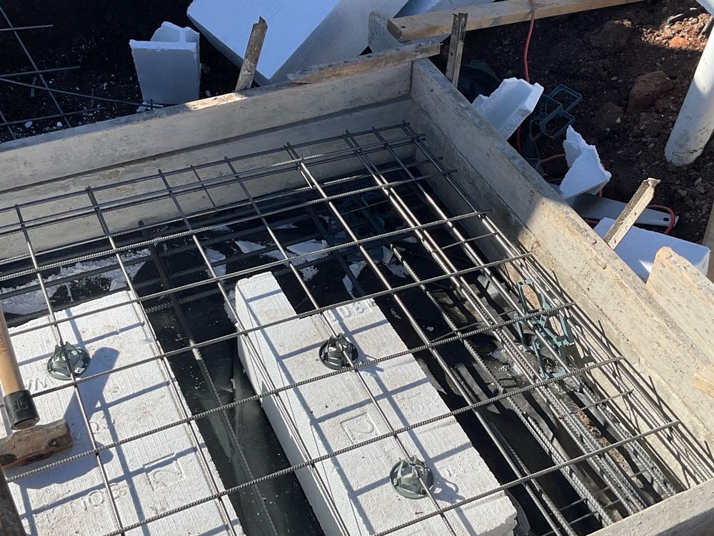 Slab mesh sagging between its supports rather than held level for the pour, found during a slab pre-pour inspection in Beveridge